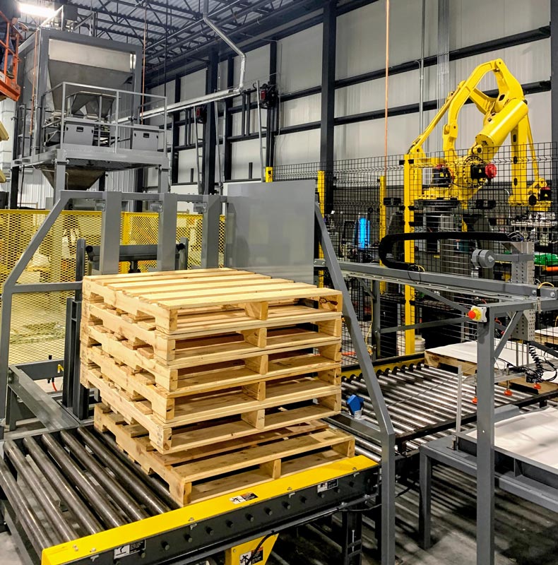 pallet dispenser and slip sheet dispenser before fanuc bag palletizing robot