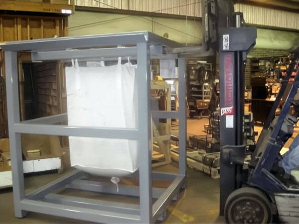 bulk tote bag lowered into bag lifting cage