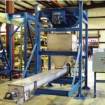 bulk bag dispenser with screw conveyor for material transfer