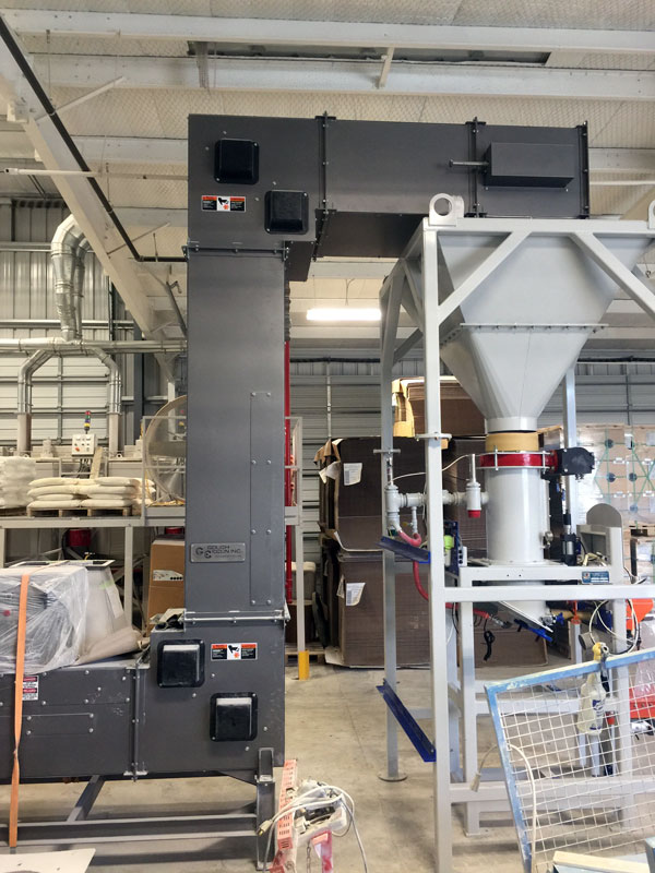 side-view-of-bucket-elevator-and-system-for-filling-50-lb-batch-inclusion-bags-with-pigment-powder