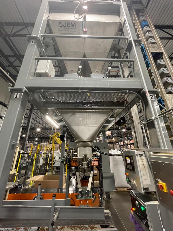 pet food bagging system with hopper feeders and automatic bag placer and scale