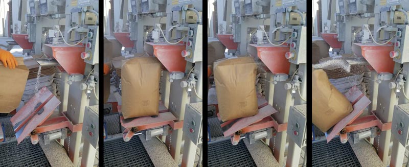 automated valve bag tip and drop onto conveyor