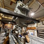 feed grain co op bagging machine with closing and palletizing conveyors