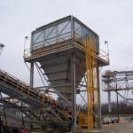 Dry Fog™ dust suppression and wind fence on hopper