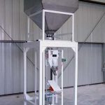 model 600 gravity fed valve bagging machine with forklift portable tote bin