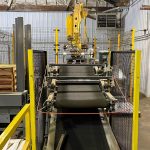 bag-flattener-conveyor-infeed-from-bag-turning-conveyor-in-robotic-bag-palletizing-system