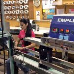 sealing bags of coffee