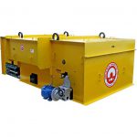 very large suspended or overhead electromagnet removes metal from conveyor