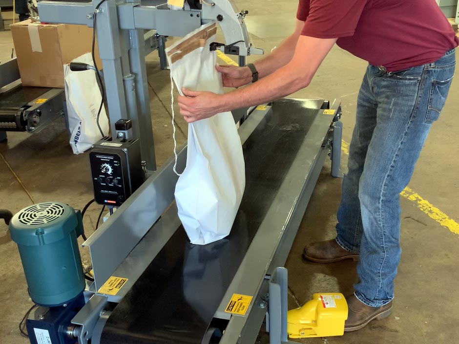 Bag Sewing Machine On a Conveyor