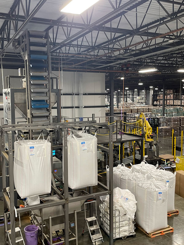 high volume repackaging system for bulk dry goods