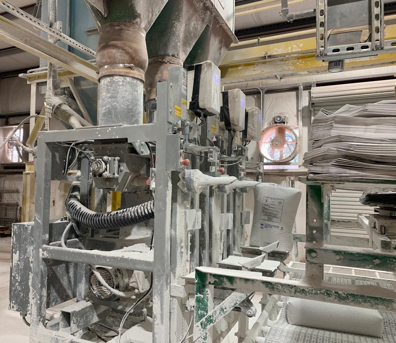 Filling Hydrated Lime Powder into 50 pound Paper Valve Bags