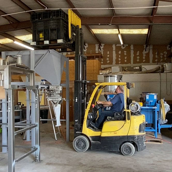 Discharging horse pellets from Buckhorn CenterFlow Seed Box into hopper