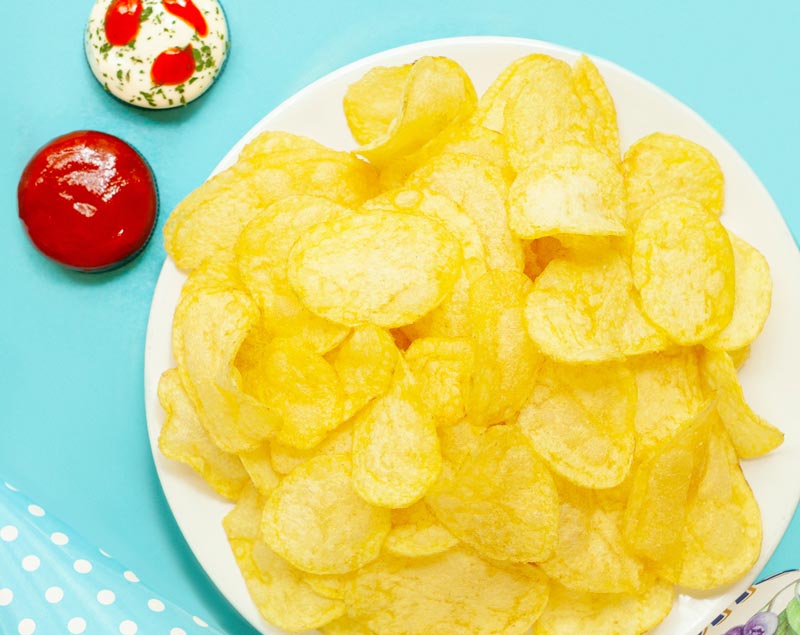 seasoning potato chips using electrostatics