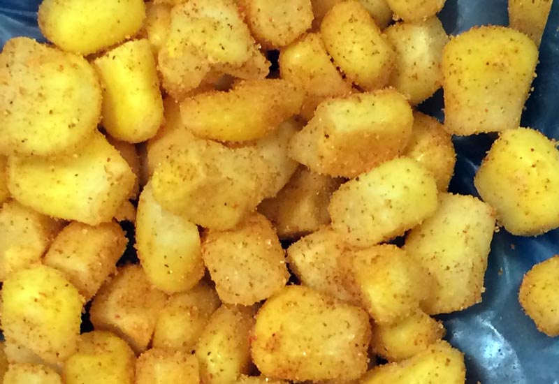 seasoned corn using coating drum and electrostatics