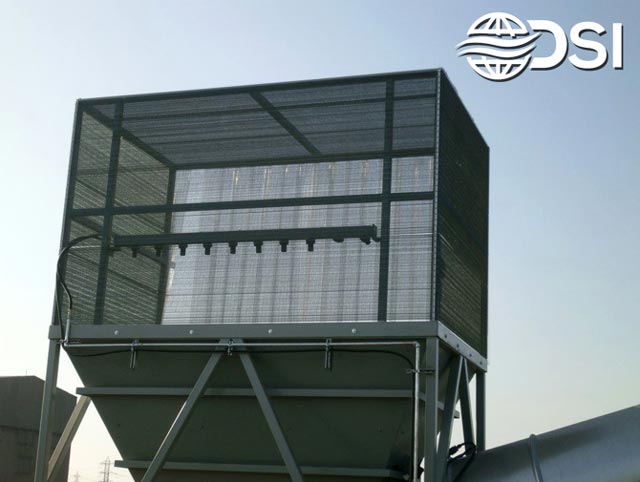 dry fog dust suppression systems with wind fences installed on top of a hopper