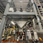 pet food bagging system with hopper feeders and automatic bag placer and scale