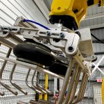 end of arm tooling for bag palletizing robot rubber boots gently squeeze bag