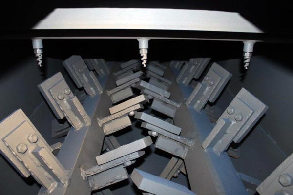 Pug mill dual mixing shafts